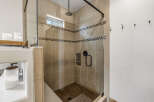 Step into a luxurious bathroom with a modern shower design.