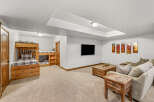 This stunning property features a cozy living space with a comfortable sofa and a stylish coffee table.