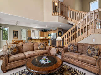 Step into luxury with this stunning property featuring a spacious living area, perfect for entertaining or relaxing.