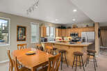 This stunning kitchen boasts a seamless blend of functionality and style, perfect for culinary enthusiasts.