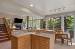 This stunning property boasts a spacious kitchen with ample counter space and cabinetry, perfect for culinary enthusiasts.