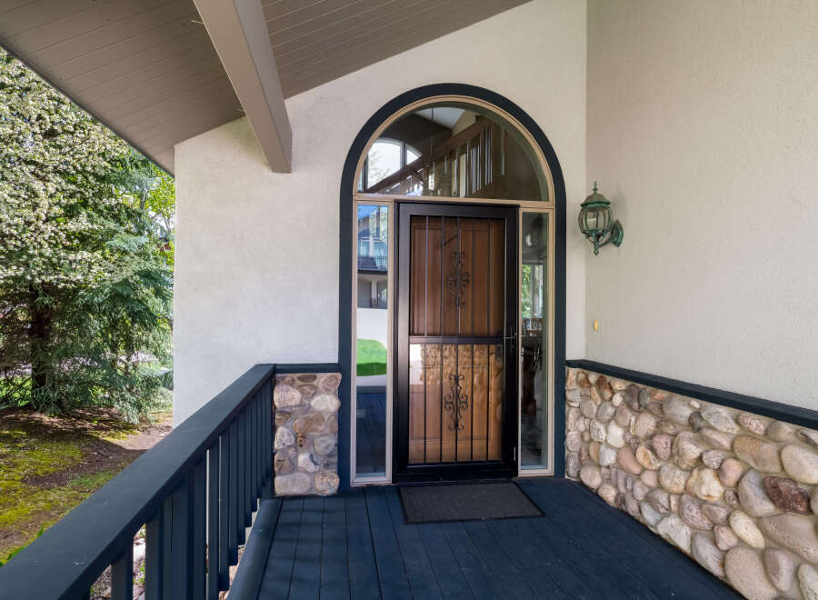 Welcome to this stunning property featuring a beautifully designed entrance.