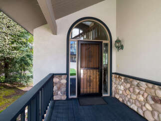 Welcome to this stunning property featuring a beautifully designed entrance.