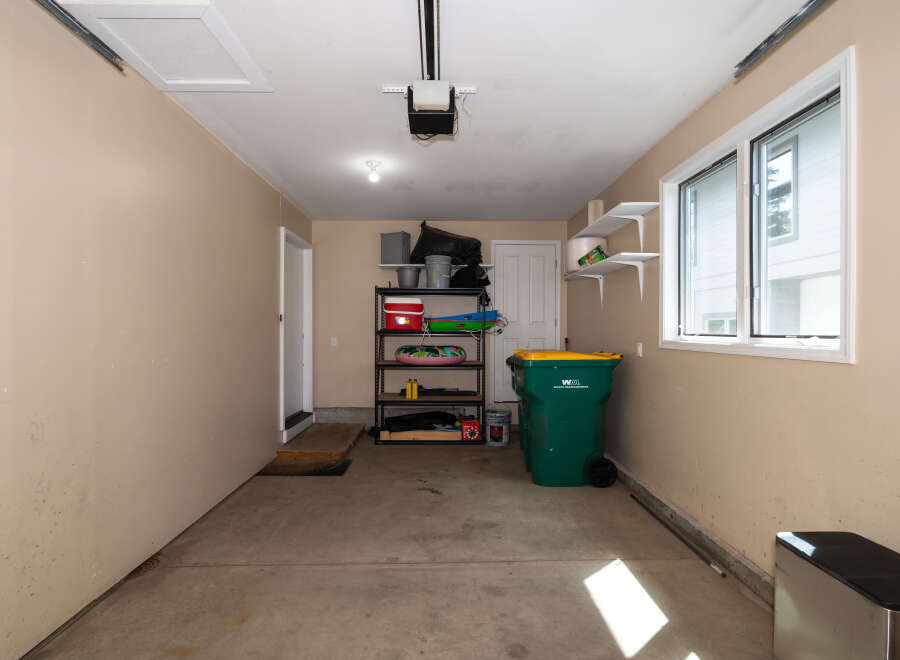 This spacious garage offers ample storage and functionality.