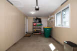 This spacious garage offers ample storage and functionality.