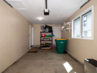 This spacious garage offers ample storage and functionality.