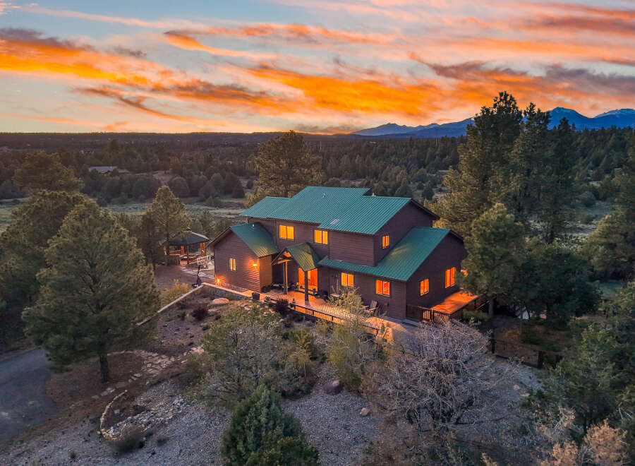 Nestled amidst a serene landscape, this stunning property offers a perfect blend of luxury and tranquility.