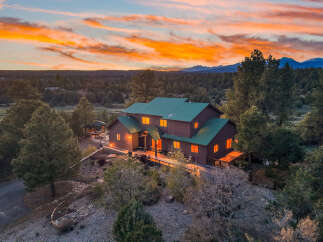 Nestled amidst a serene landscape, this stunning property offers a perfect blend of luxury and tranquility.