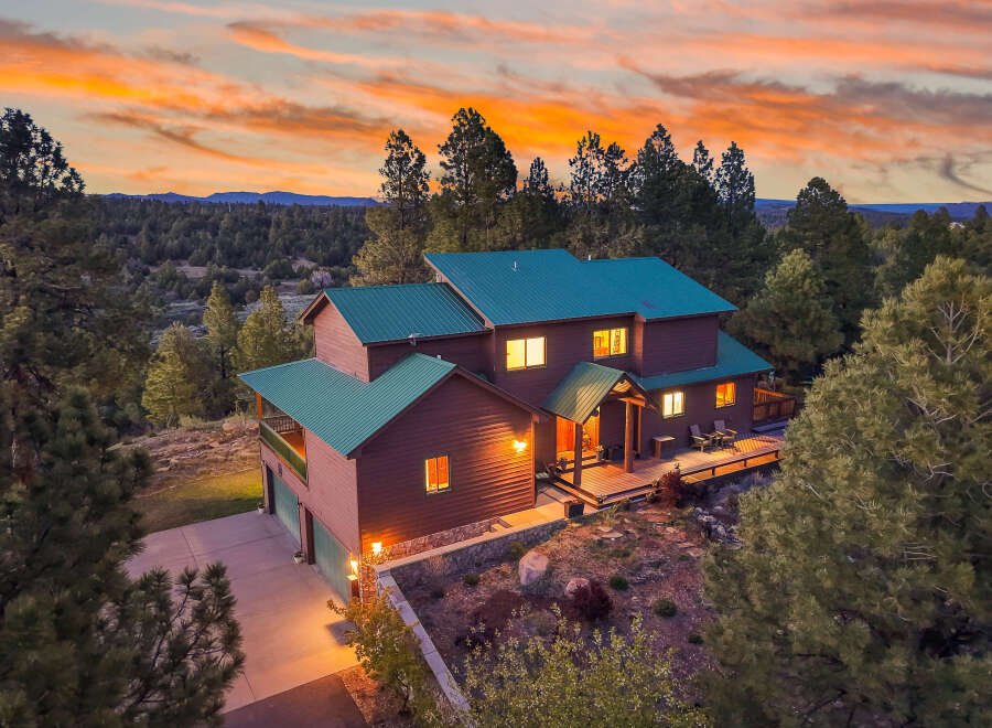 Nestled amidst a stunning natural landscape, this beautiful home offers a tranquil retreat.