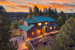 Nestled amidst a stunning natural landscape, this beautiful home offers a tranquil retreat.