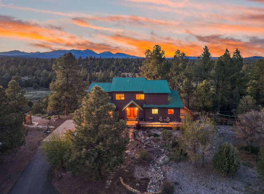Nestled amidst the serene beauty of nature, this stunning property offers a perfect blend of luxury and tranquility.