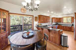 This stunning kitchen boasts a seamless blend of rustic charm and modern convenience.
