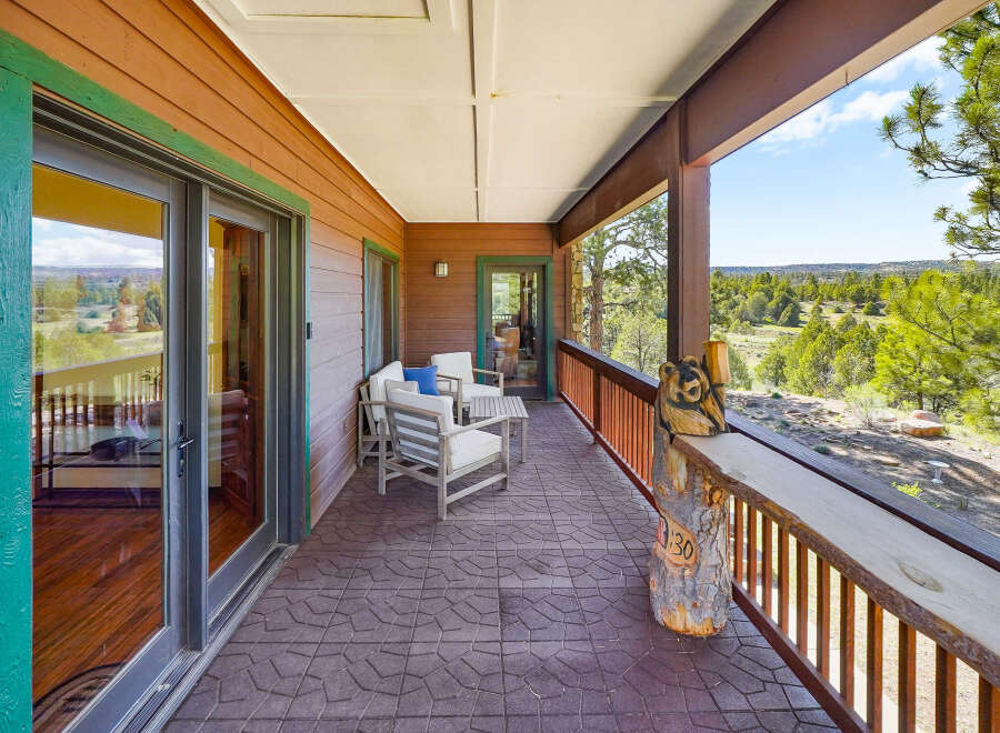 Enjoy breathtaking views from this stunning property's expansive deck.