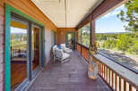 Enjoy breathtaking views from this stunning property's expansive deck.