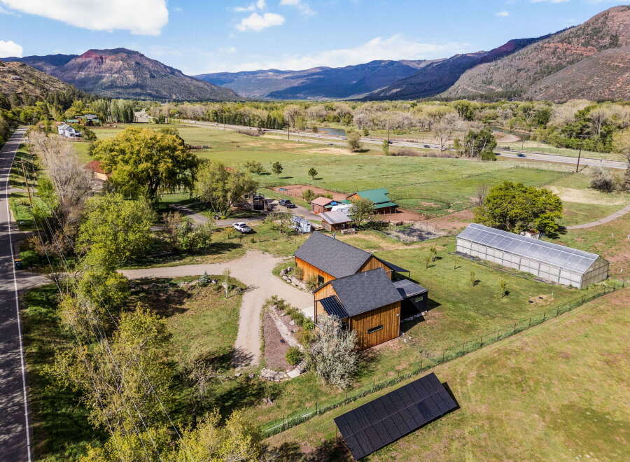 Discover your dream home nestled in a picturesque landscape! This stunning property boasts a modern farmhouse with ample space and privacy.