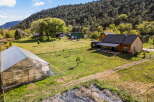 Discover your dream property! This stunning estate features a charming house, a greenhouse, and expansive land, perfect for gardening or farming.