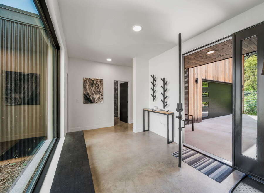 Step into modern elegance with this stunning entryway.