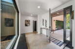 Step into modern elegance with this stunning entryway.