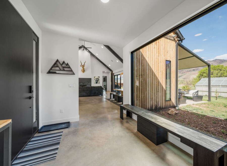 Step into modern elegance with this stunning property, showcasing a seamless blend of indoor and outdoor living.