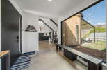 Step into modern elegance with this stunning property, showcasing a seamless blend of indoor and outdoor living.