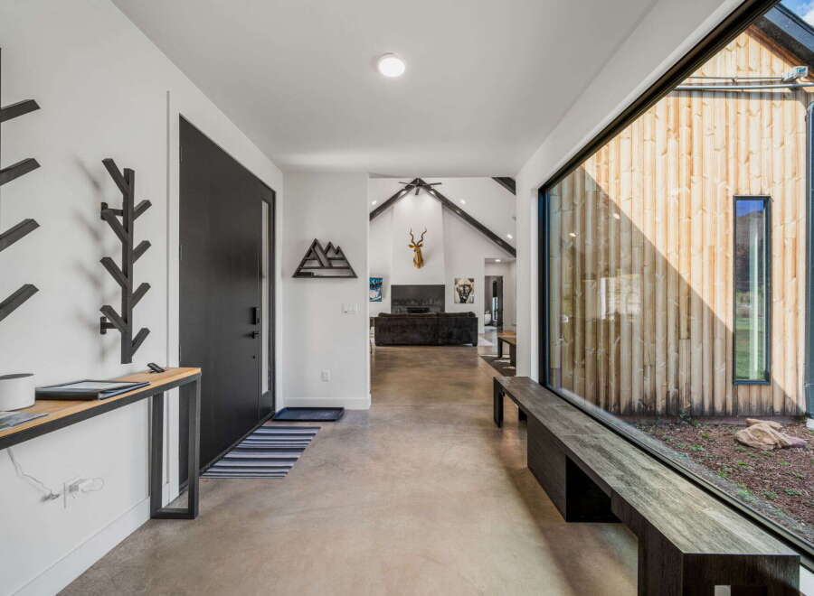 Step into modern elegance with this stunning entryway.