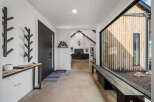 Step into modern elegance with this stunning entryway.