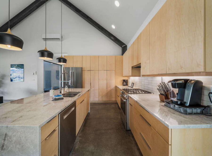 Step into modern elegance with this stunning kitchen! Featuring sleek cabinetry, stainless steel appliances, and a spacious island, this kitchen is perfect for both cooking and entertaining.