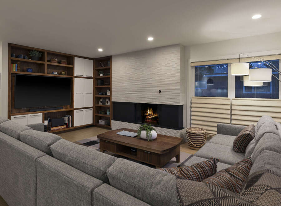 This stunning living room boasts a modern design with a cozy fireplace, perfect for relaxing evenings.