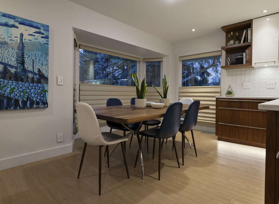 This stunning dining area boasts a modern aesthetic, perfect for both everyday meals and entertaining guests.