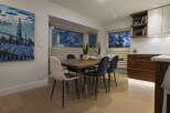 This stunning dining area boasts a modern aesthetic, perfect for both everyday meals and entertaining guests.