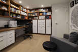 This stunning home office boasts custom built-in bookshelves, providing ample storage for books and decor.