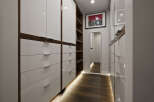 Step into luxury with this stunning walk-in closet, designed for both style and functionality.