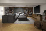 This stunning living space features a cozy sectional sofa and a stylish ottoman, perfect for relaxing and entertaining.