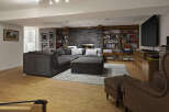 This stunning living space boasts a cozy sectional sofa, perfect for relaxing and entertaining.