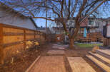 This stunning property boasts a beautifully landscaped backyard, perfect for outdoor entertaining.