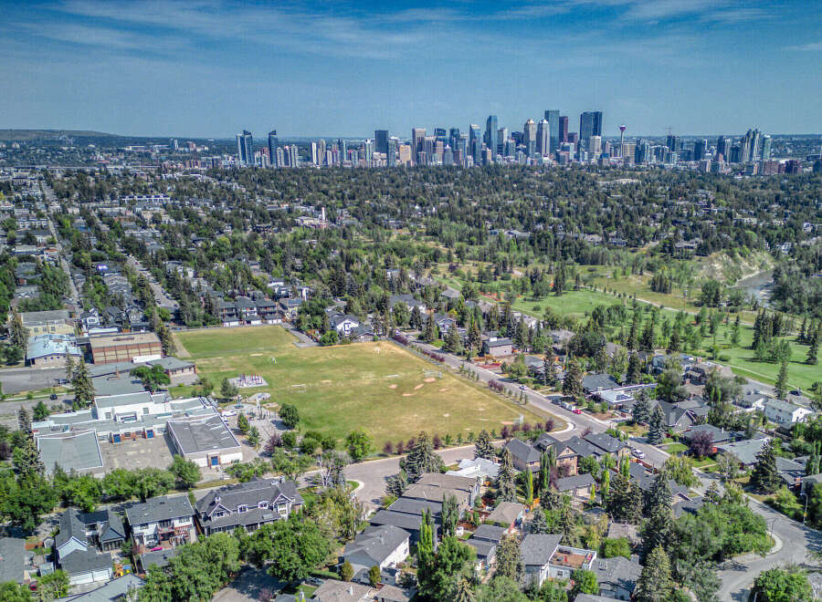 Explore the stunning cityscape from this aerial view, showcasing a vibrant urban landscape.