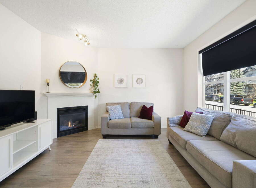 Step into this inviting living space, perfect for relaxation and entertaining.