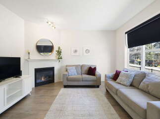 Step into this inviting living space, perfect for relaxation and entertaining.