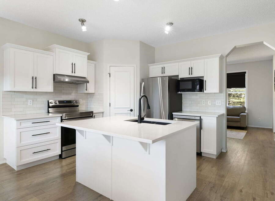 This stunning kitchen boasts modern design and functionality.