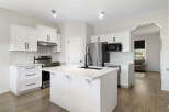 This stunning kitchen boasts modern design and functionality.
