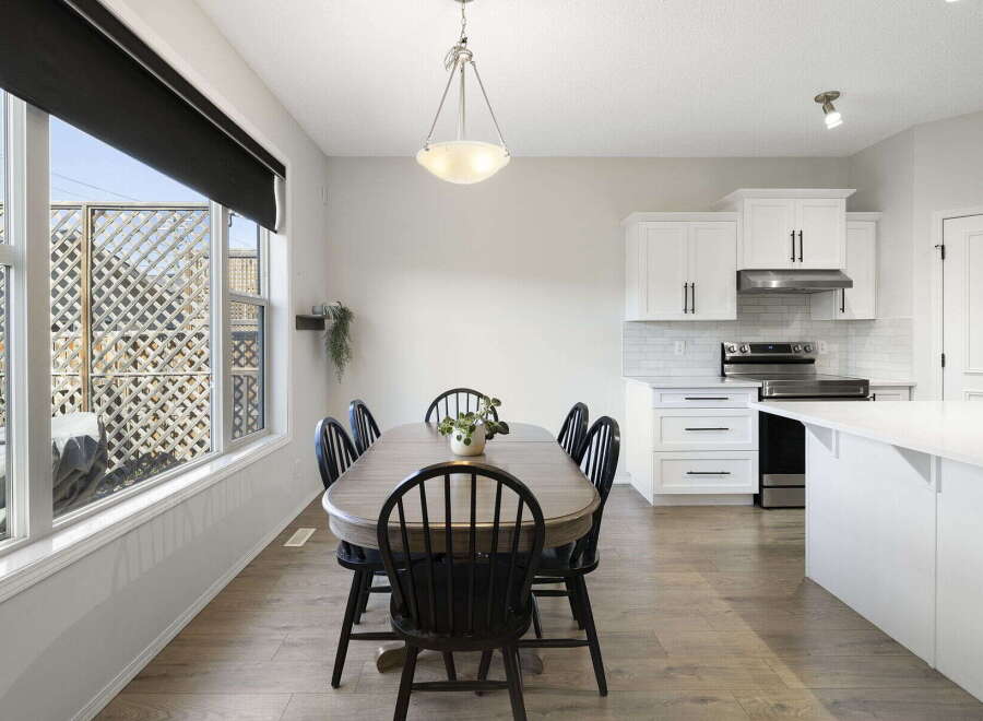 Step into this inviting dining area, perfect for both everyday meals and entertaining.