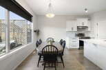 Step into this inviting dining area, perfect for both everyday meals and entertaining.