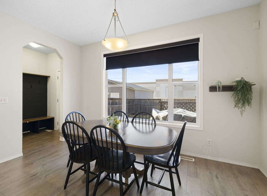 Step into this inviting dining room, perfect for family gatherings and entertaining guests.