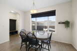 Step into this inviting dining room, perfect for family gatherings and entertaining guests.