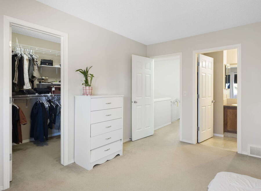 Step into this inviting bedroom, featuring a spacious walk-in closet perfect for organizing your wardrobe.