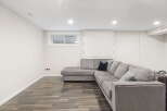 Discover the comfort of this inviting living space, perfect for relaxation and entertaining.
