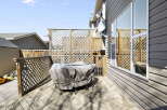 Enjoy outdoor living on this beautiful deck! This property features a spacious deck, perfect for entertaining or relaxing.