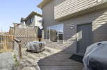 Enjoy outdoor living on this beautiful deck! This property features a spacious deck, perfect for entertaining or relaxing.