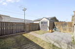 Discover the charm of this property, featuring a well-maintained backyard.