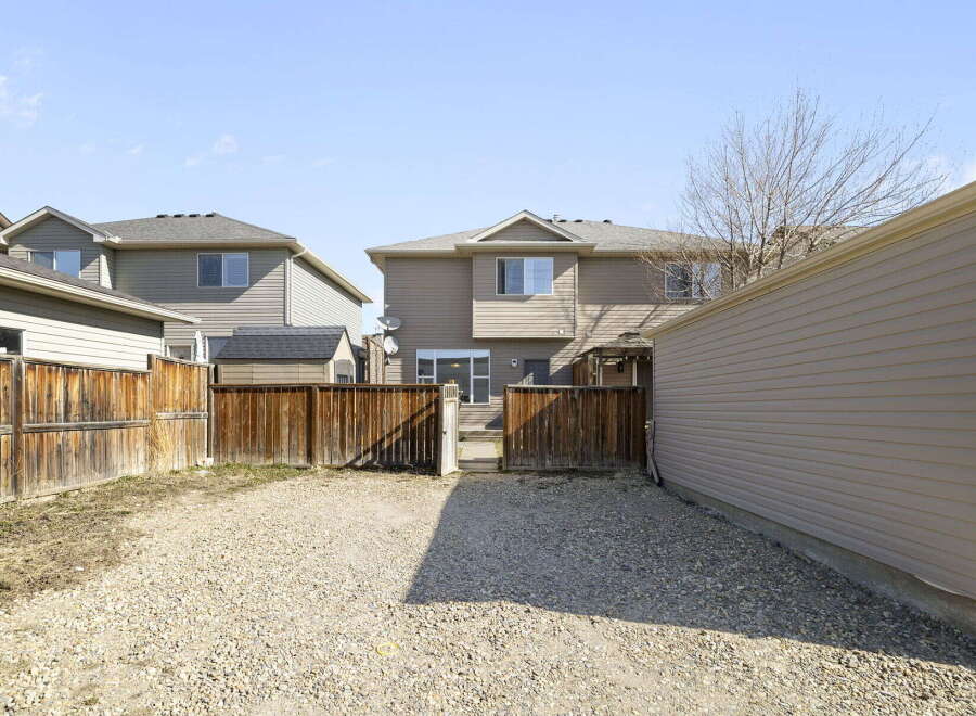 Discover this charming property featuring a spacious backyard, perfect for outdoor gatherings and relaxation.